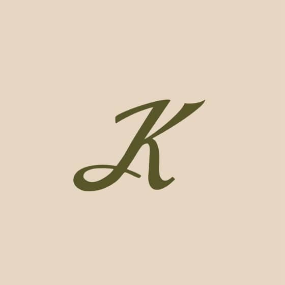 K monogram lettermark on cream paper