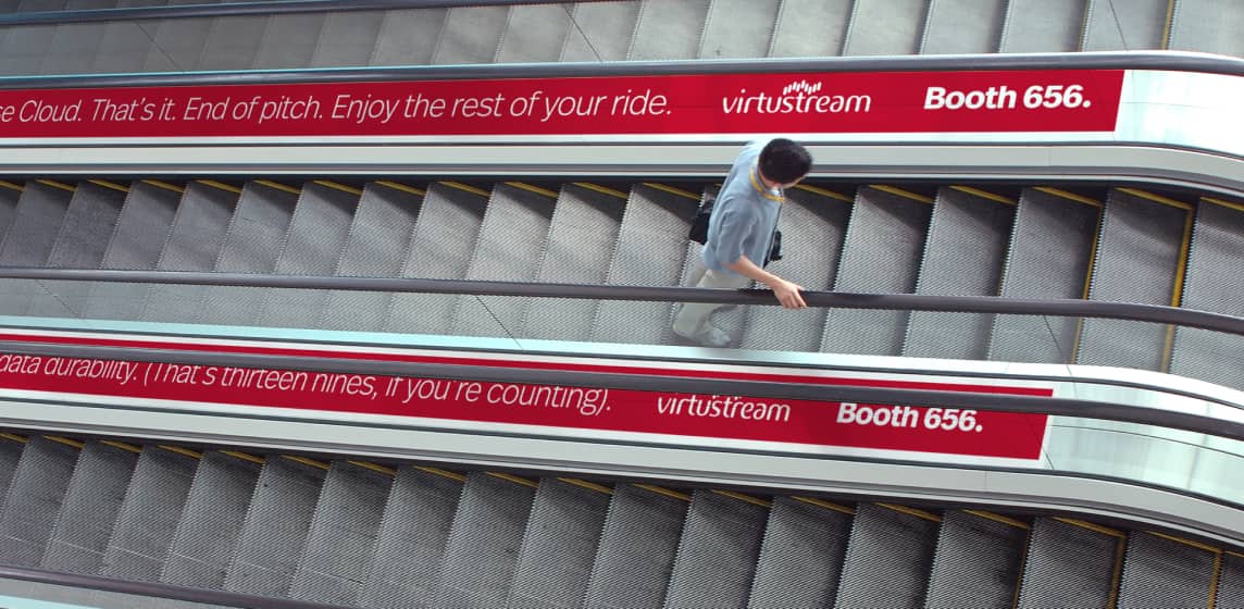 Virtusteam Booth 666 escalator environmental banner takeover