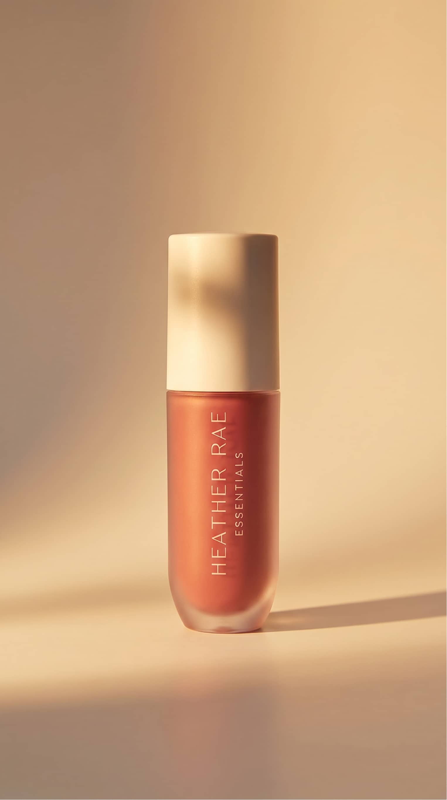 Art-directed beauty portrait with sunlit skin and glossy lip application