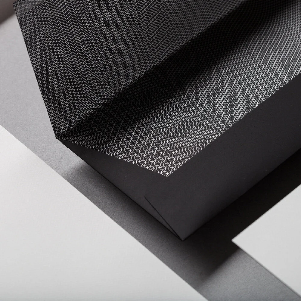 Woven micro-security pattern printed inside Silent Quadrant envelope flap